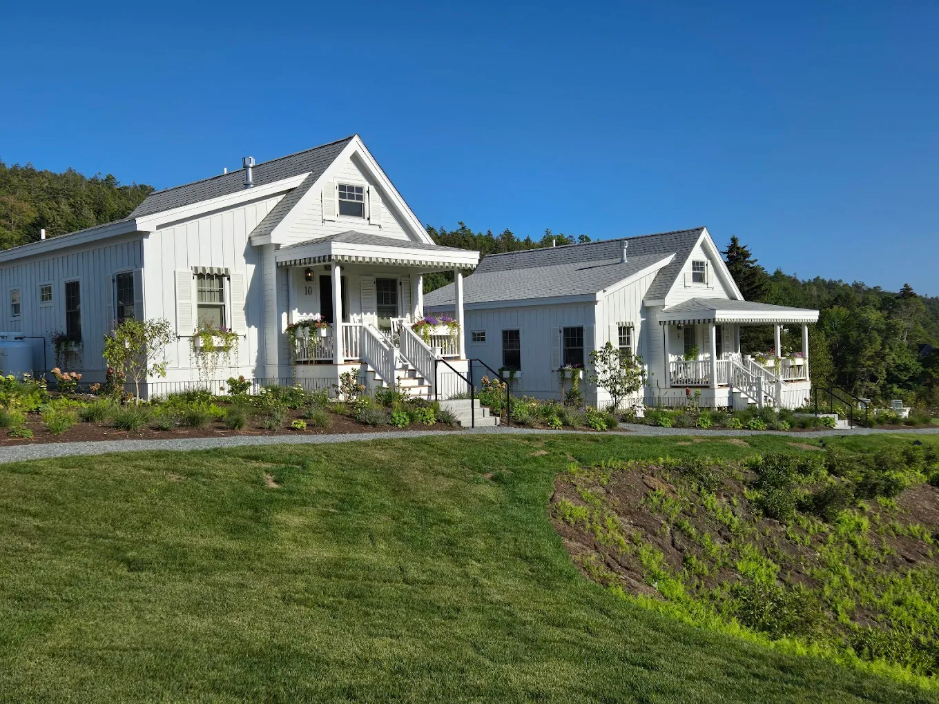 Inn buildings with porch columns and exterior finish complete