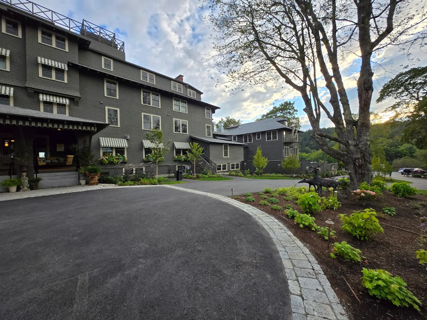 Hotel property exterior with guest wings and covered entry