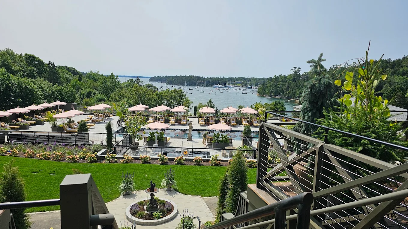 Resort grounds with railing and exterior finish work in view