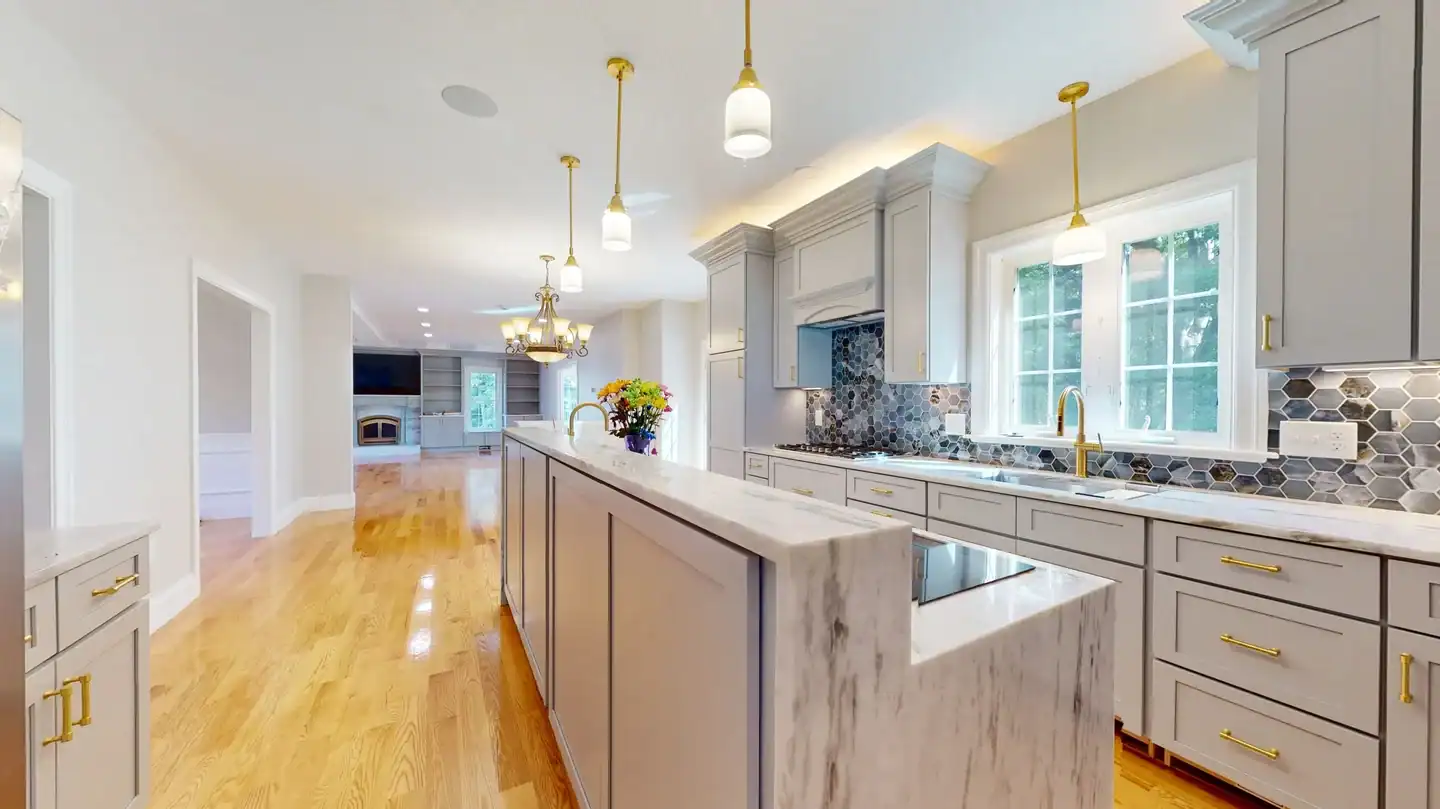 Kitchen cabinet installation with finished trim and panel ends