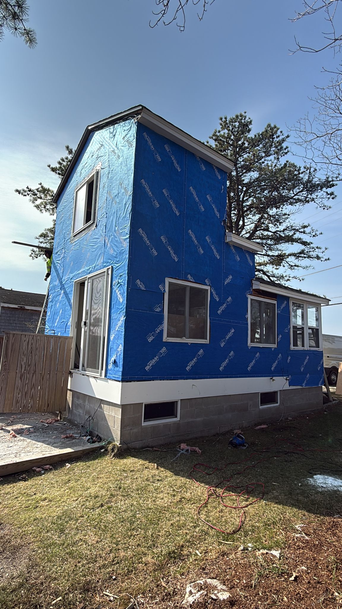 Building wrapped and prepared for exterior finish work