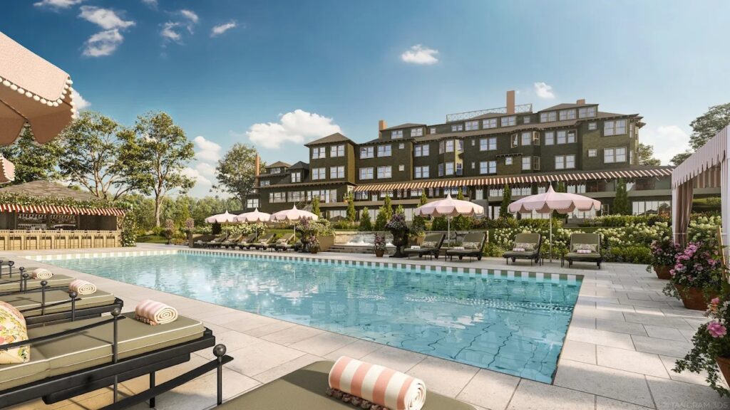 Luxury outdoor pool area with lounge chairs, pink umbrellas, landscaped garden, and multi-story residential building in the background